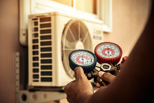 Professional Heat Pump Repair technician working in Gosport, IN